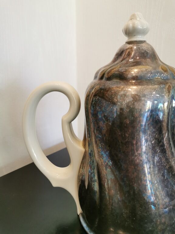Silver-plated ceramic jug