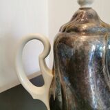 Silver-plated ceramic jug