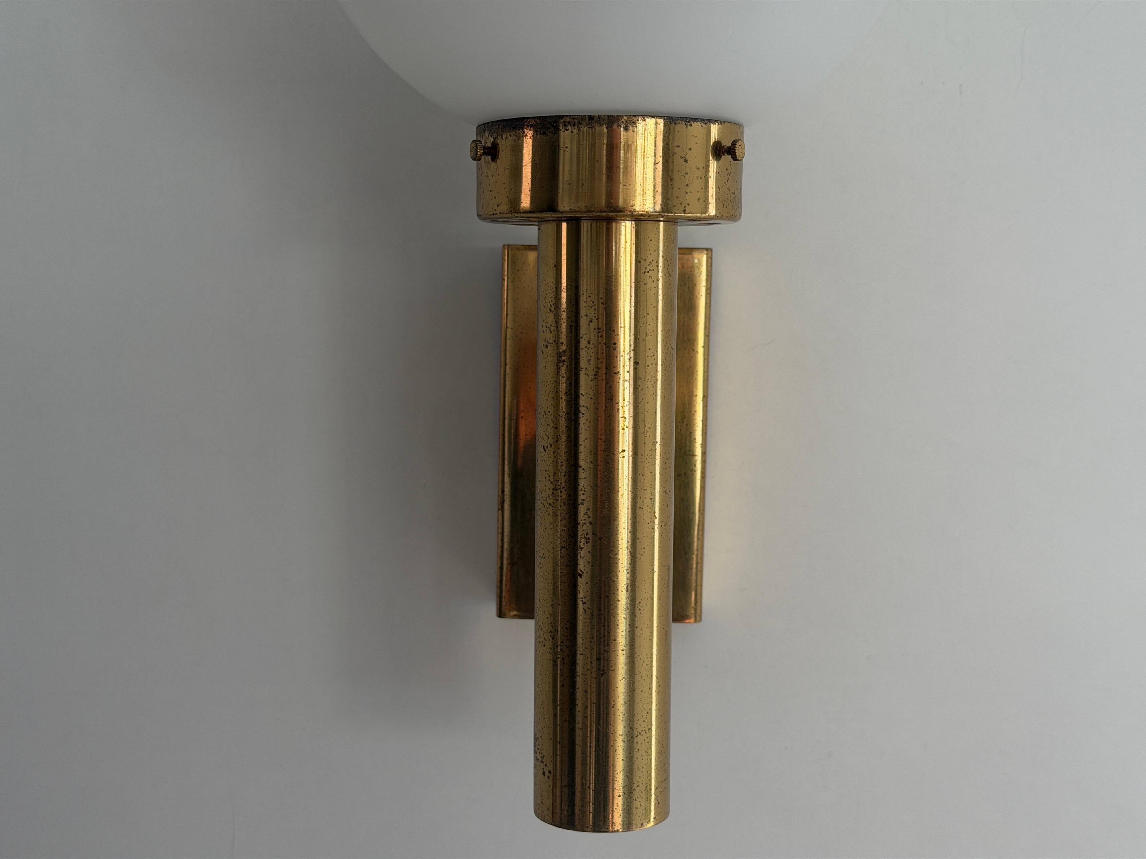 Large minimalist cinema wall light in opal glass and heavy brass, 1960s, Germany