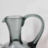 Engraved glass pitcher