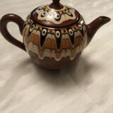 Combination of a teapot and a milk pot