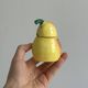 Yellow ceramic pear-shaped salt shaker