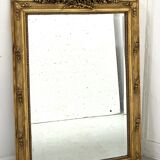 Miroir de style Louis XVI en bois et stuc doré XIX siècle
