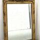 Louis XVI style mirror in wood and gilded stucco, 19th century