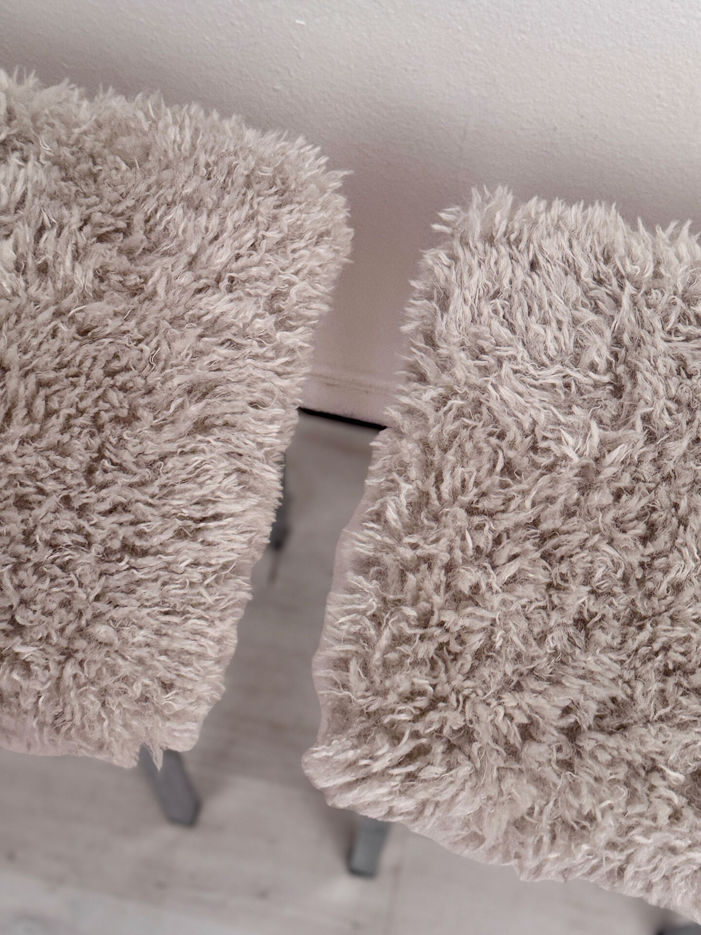 Set of two vintage chrome stools with fluffy upholstery