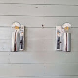 Pair of tubular wall sconces in chrome metal, 1970.