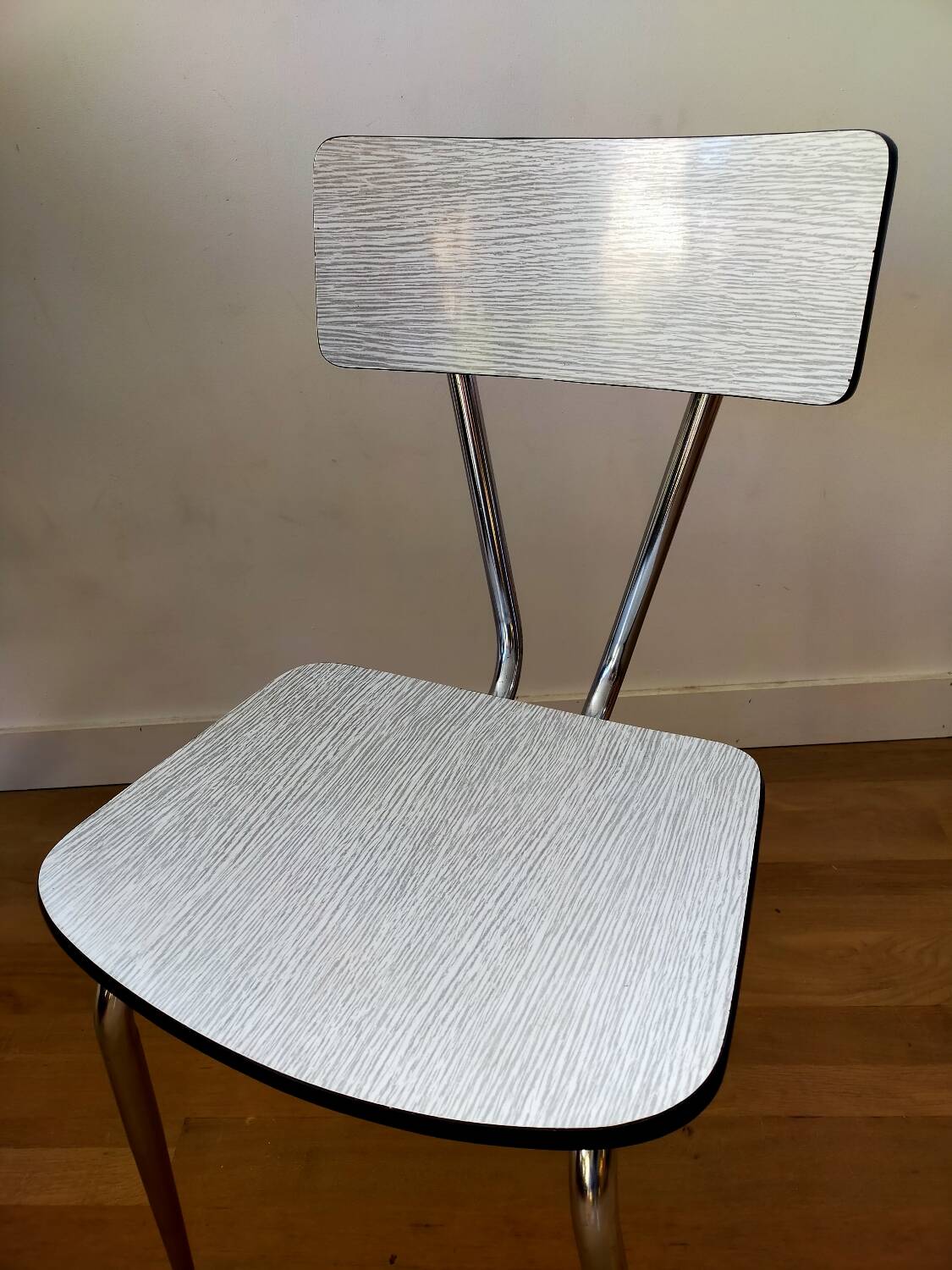 White and blue formica chair
