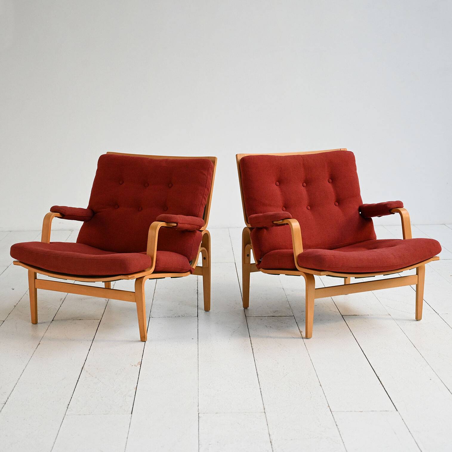 Pair of “Ingrid” armchairs by Bruno Mathsson for Dux, 1960s