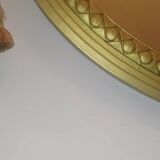 Oval mirror in wood and gilded plaster with pompom decoration