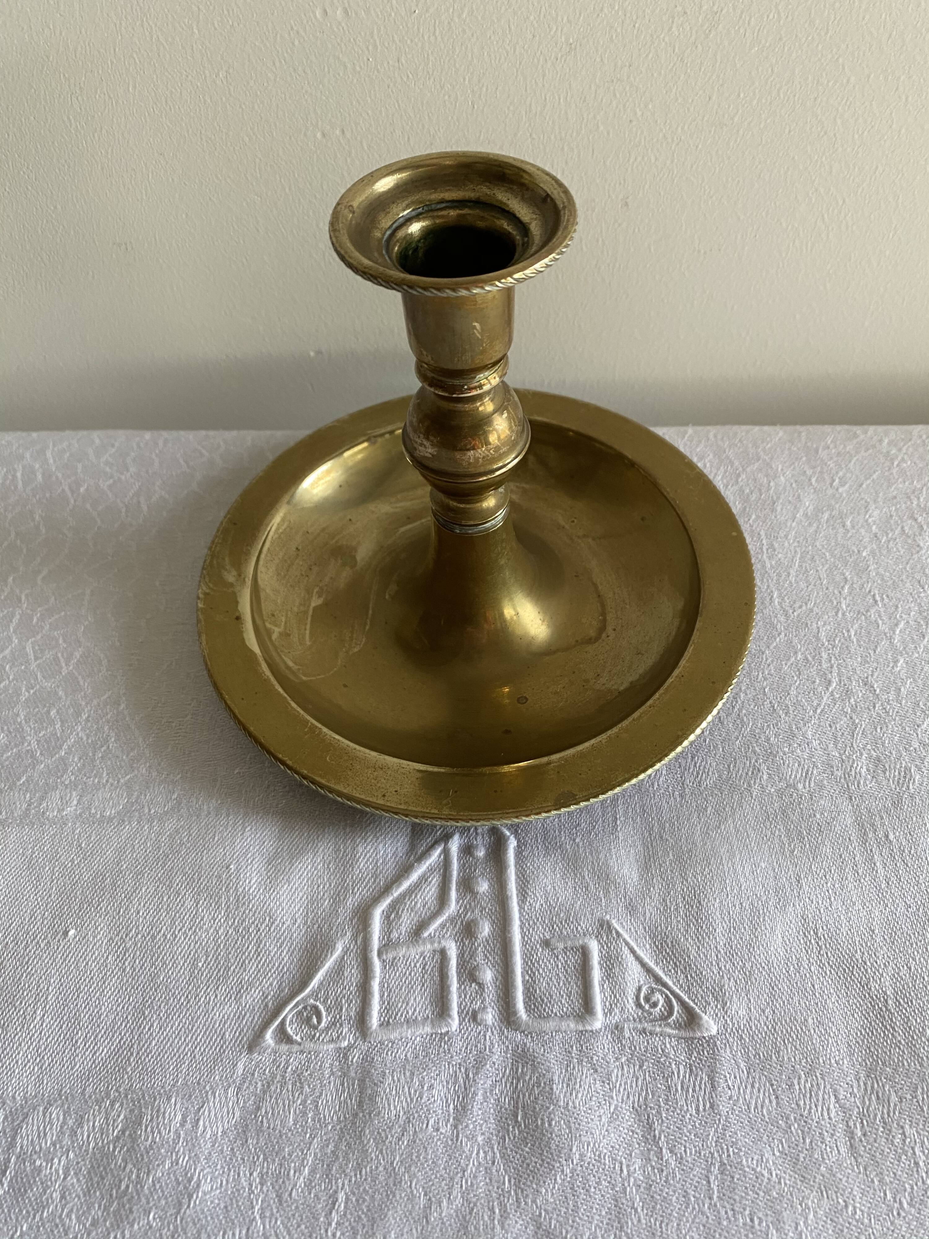 Antique brass candle holder