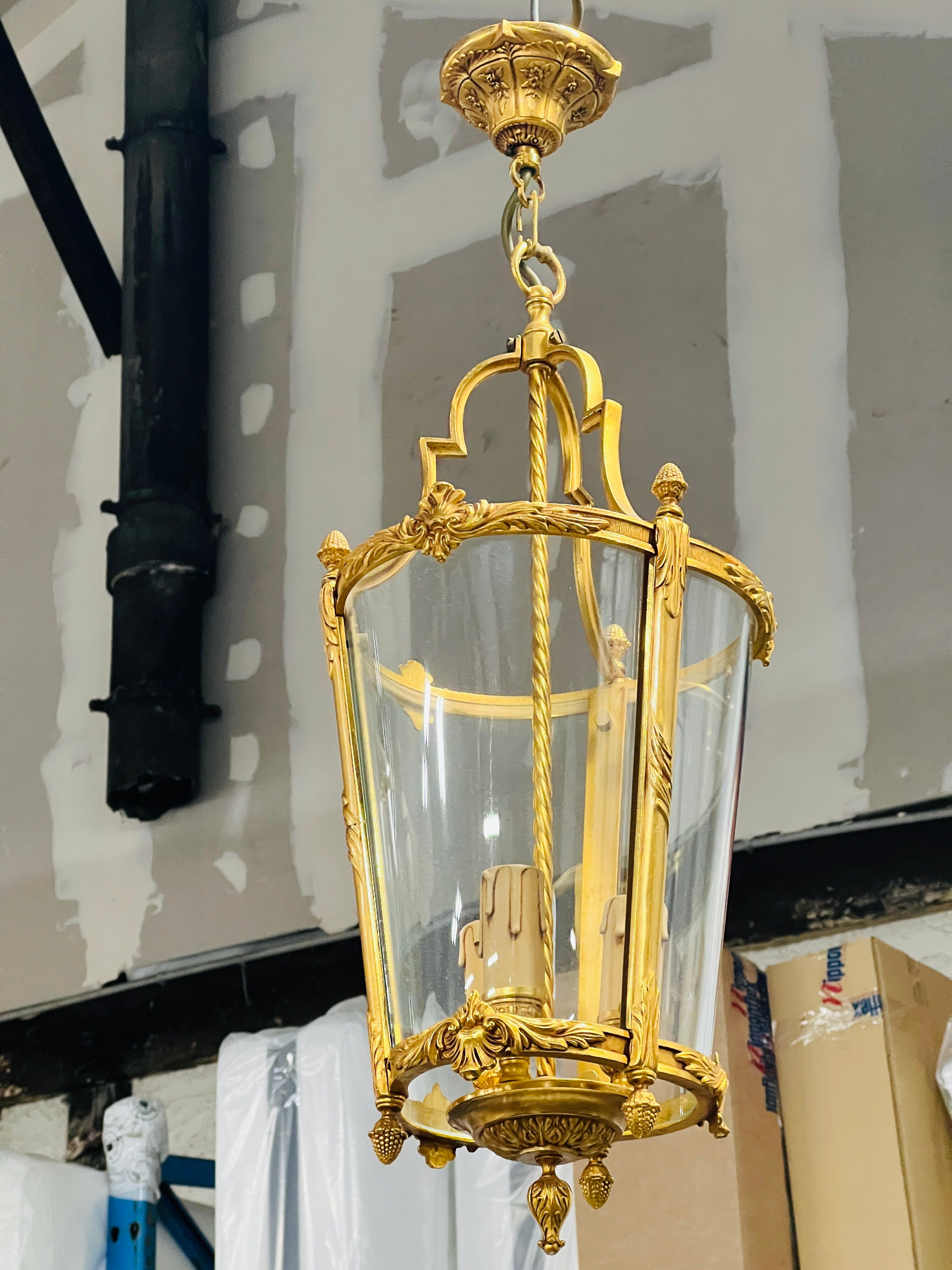 Louis XV style lantern suspension in gilded bronze and glass