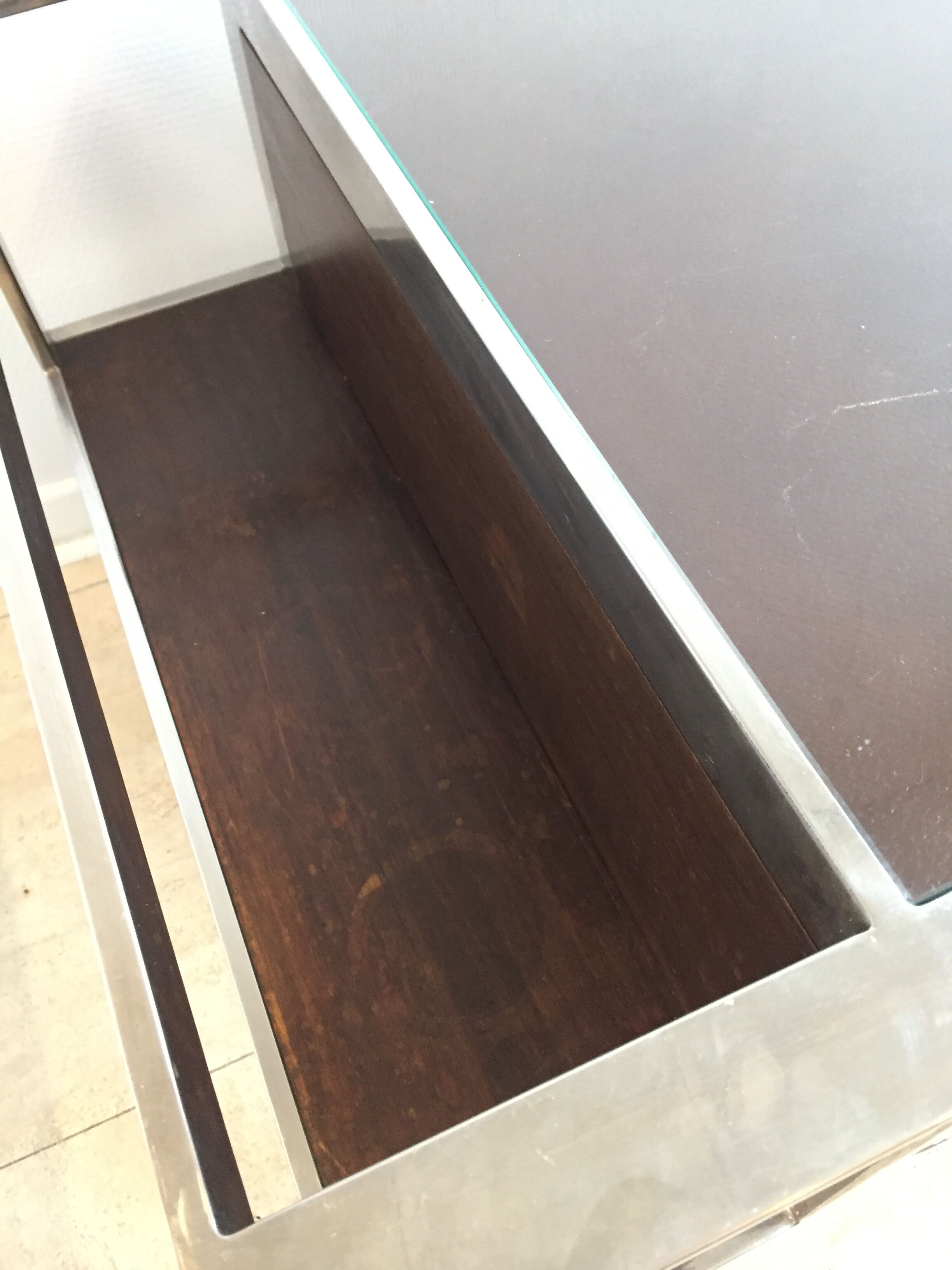 Art deco coffee table in glass and chrome