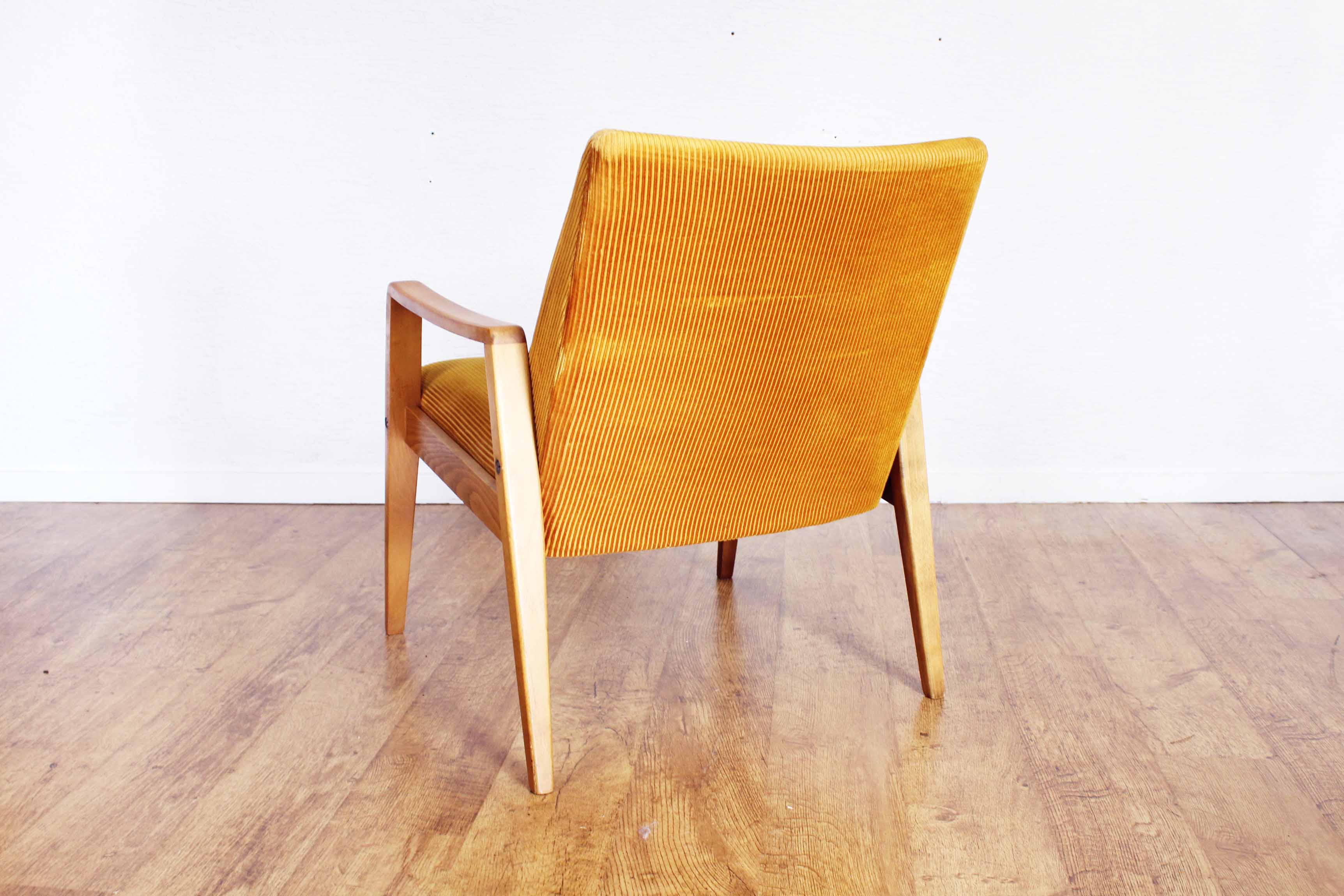 Scandinavian-designed chair in solid beech and mustard velvet