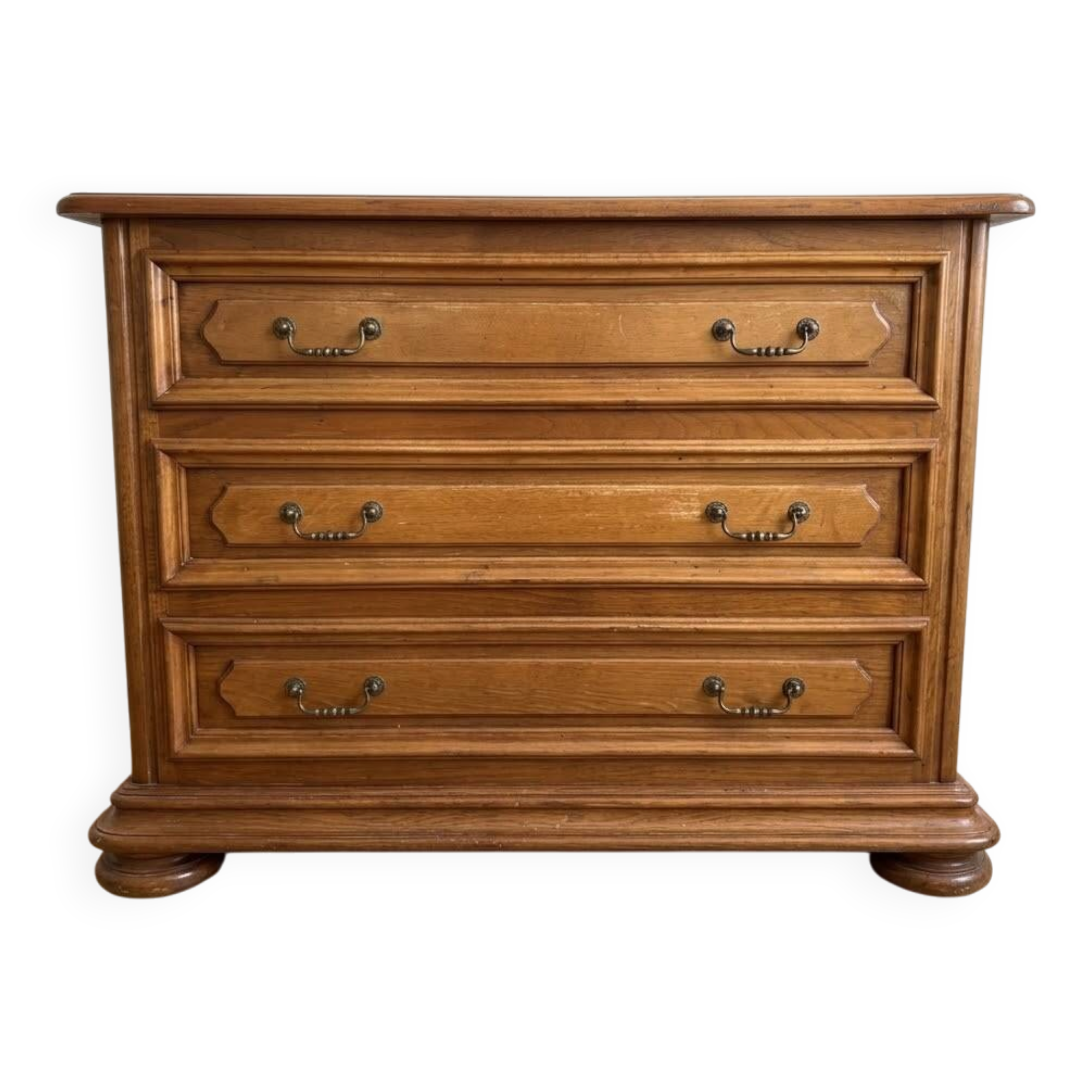 Antique wooden chest of drawers with three drawers.