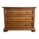 Antique wooden chest of drawers with three drawers.