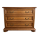 Antique wooden chest of drawers with three drawers.