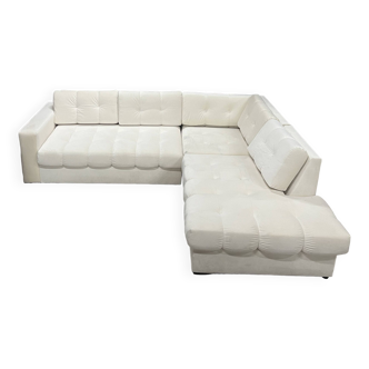 Corner sofa in light beige velvet