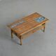 Coffee table with blue ceramic tiles by Robert and Jean Cloutier