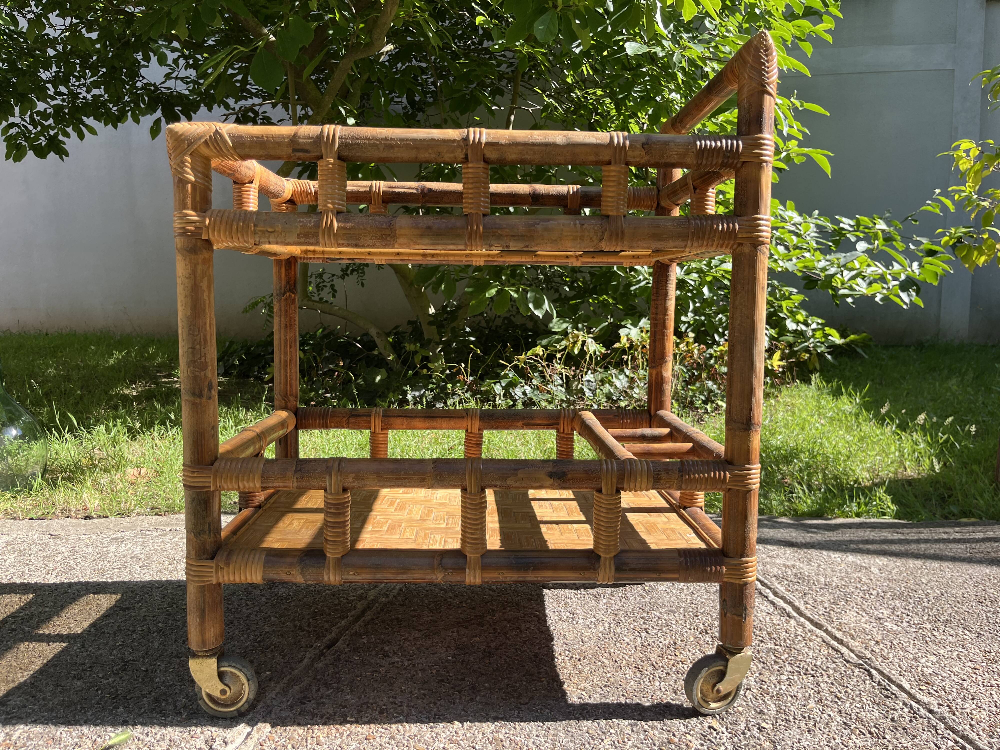 Vintage 1950s bamboo trolley or serving cart.