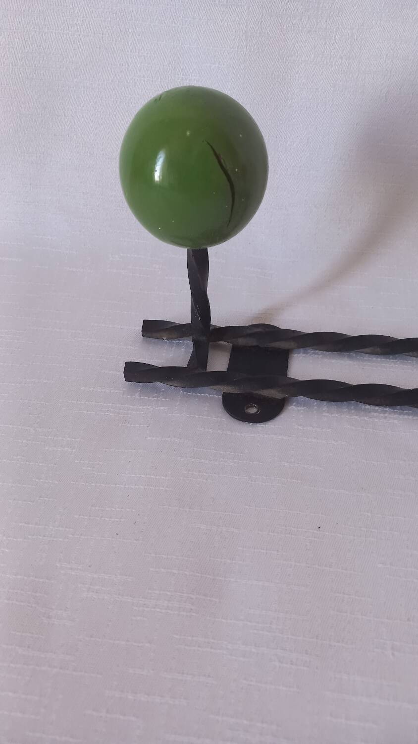 Vintage ball and metal coat racks