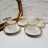 White and gold porcelain coffee maker and cups