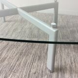 Design coffee table in beveled glass and steel foot
