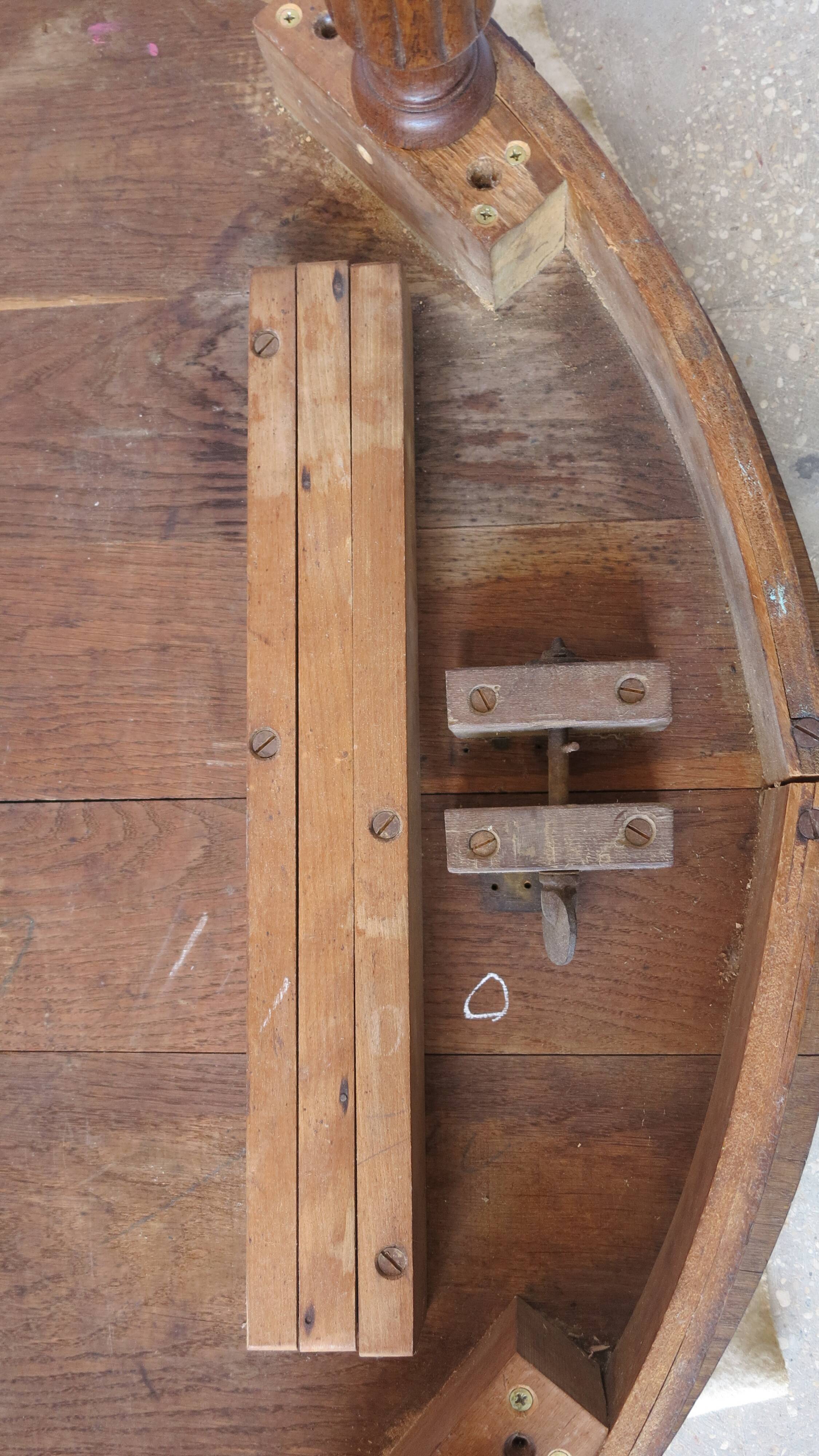 1930s oak dining table, slightly oval.
