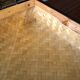 Vintage braided wicker suitcase