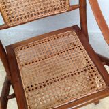 Bamboo folding armchair and caning, leather and brass