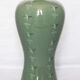 Korean vase in crackled celadon with a pattern of ducks and clouds.