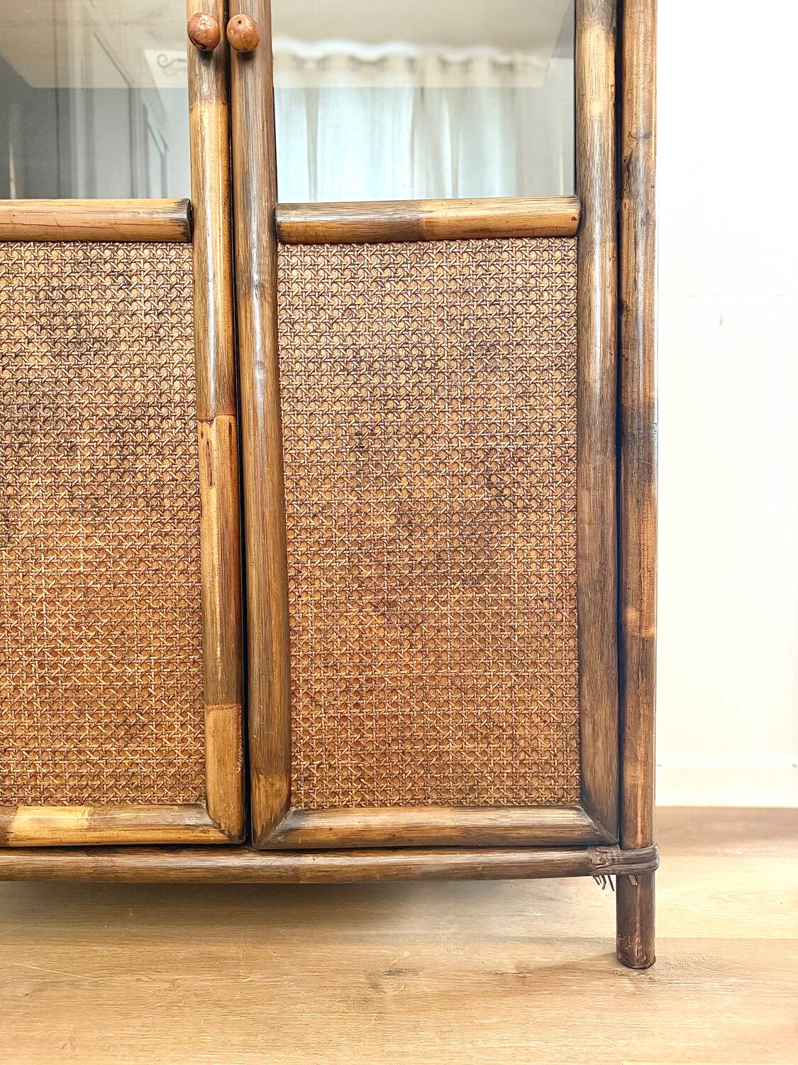 Glass cabinet in bamboo and cane