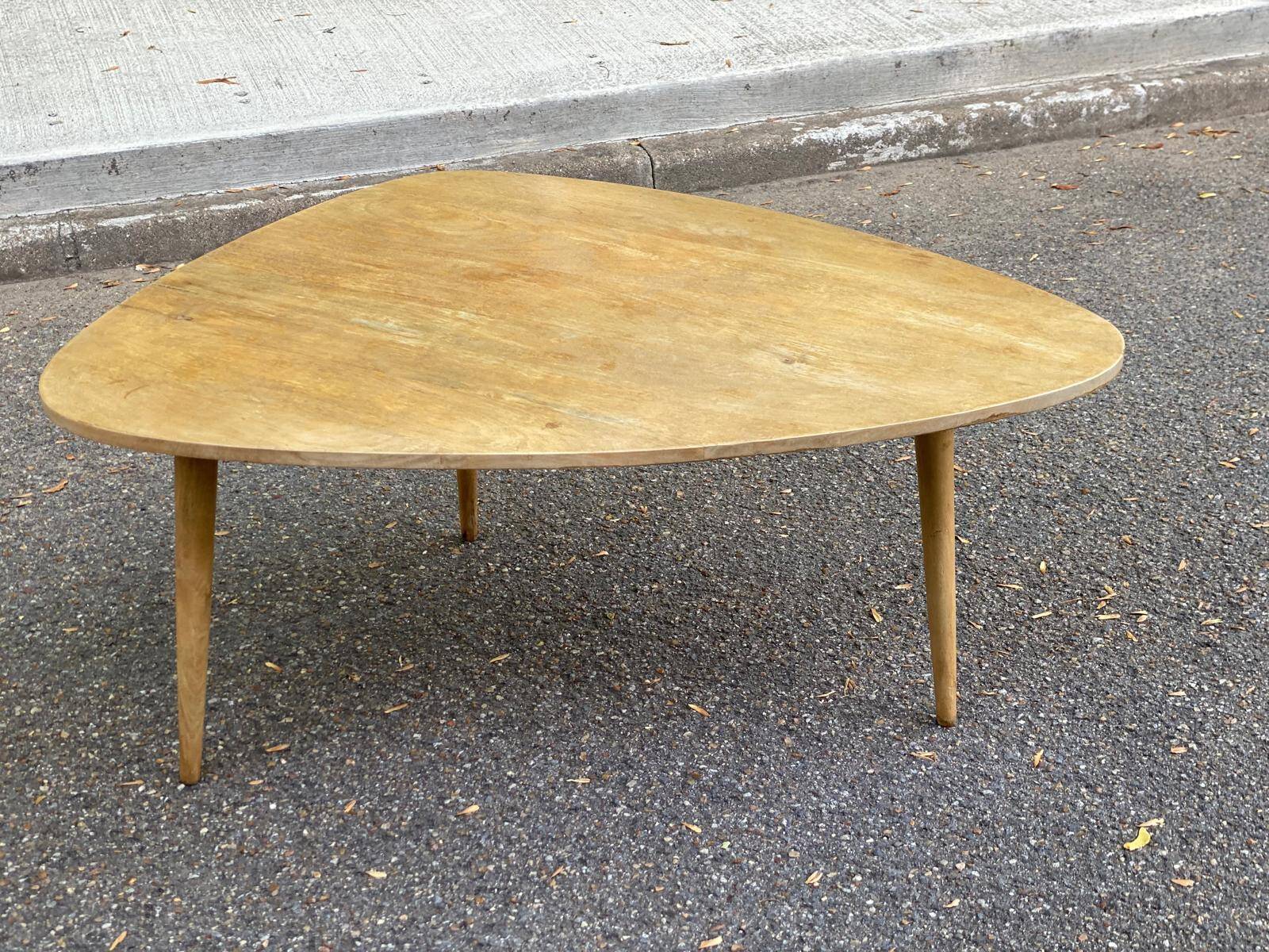 Scandinavian coffee table in the shape of a pebble/bean made of light solid wood from the years.