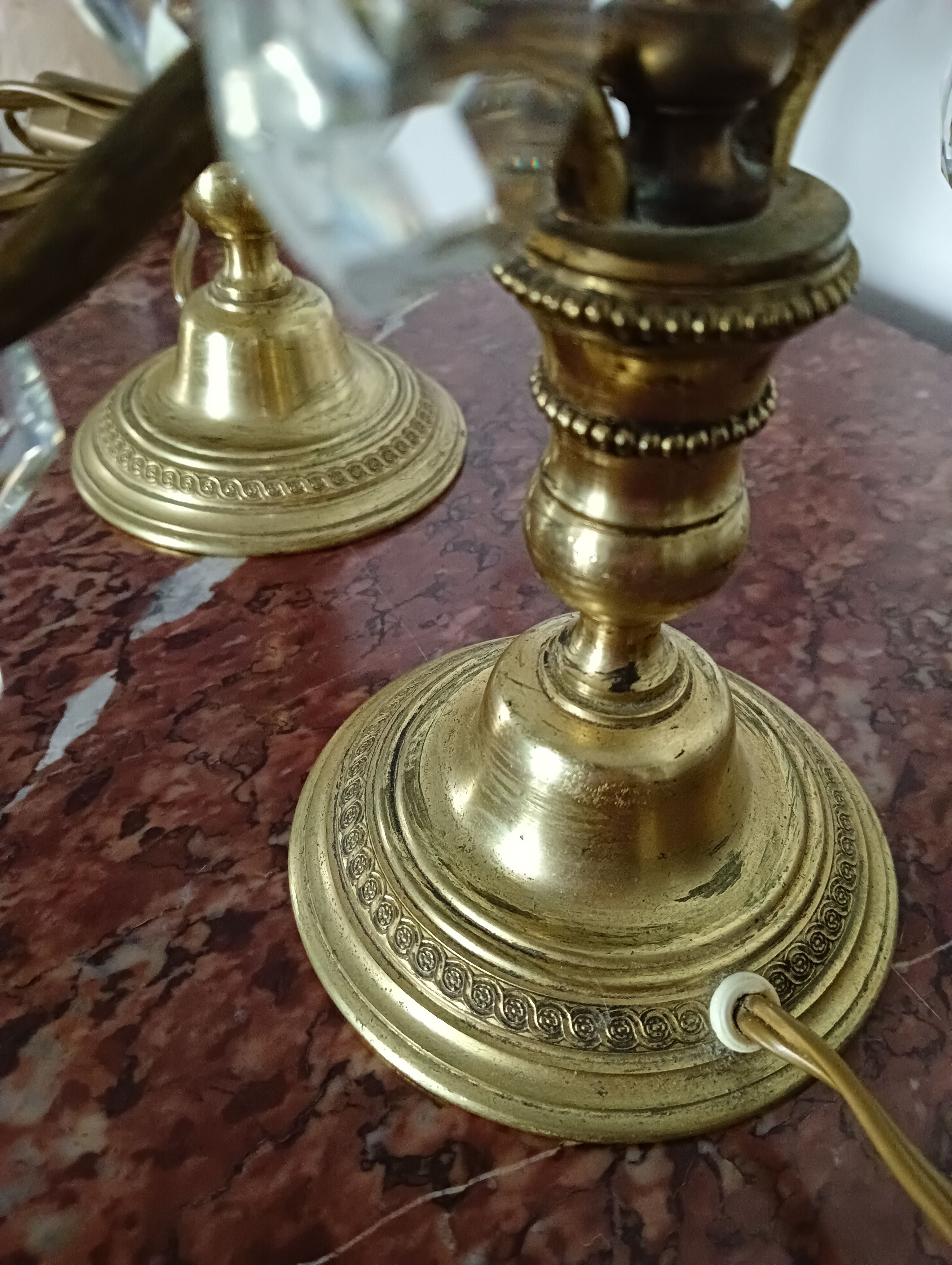 Pair of bronze girandoles with crystal pendants, two arms of lights.