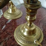 Pair of bronze girandoles with crystal pendants, two arms of lights.