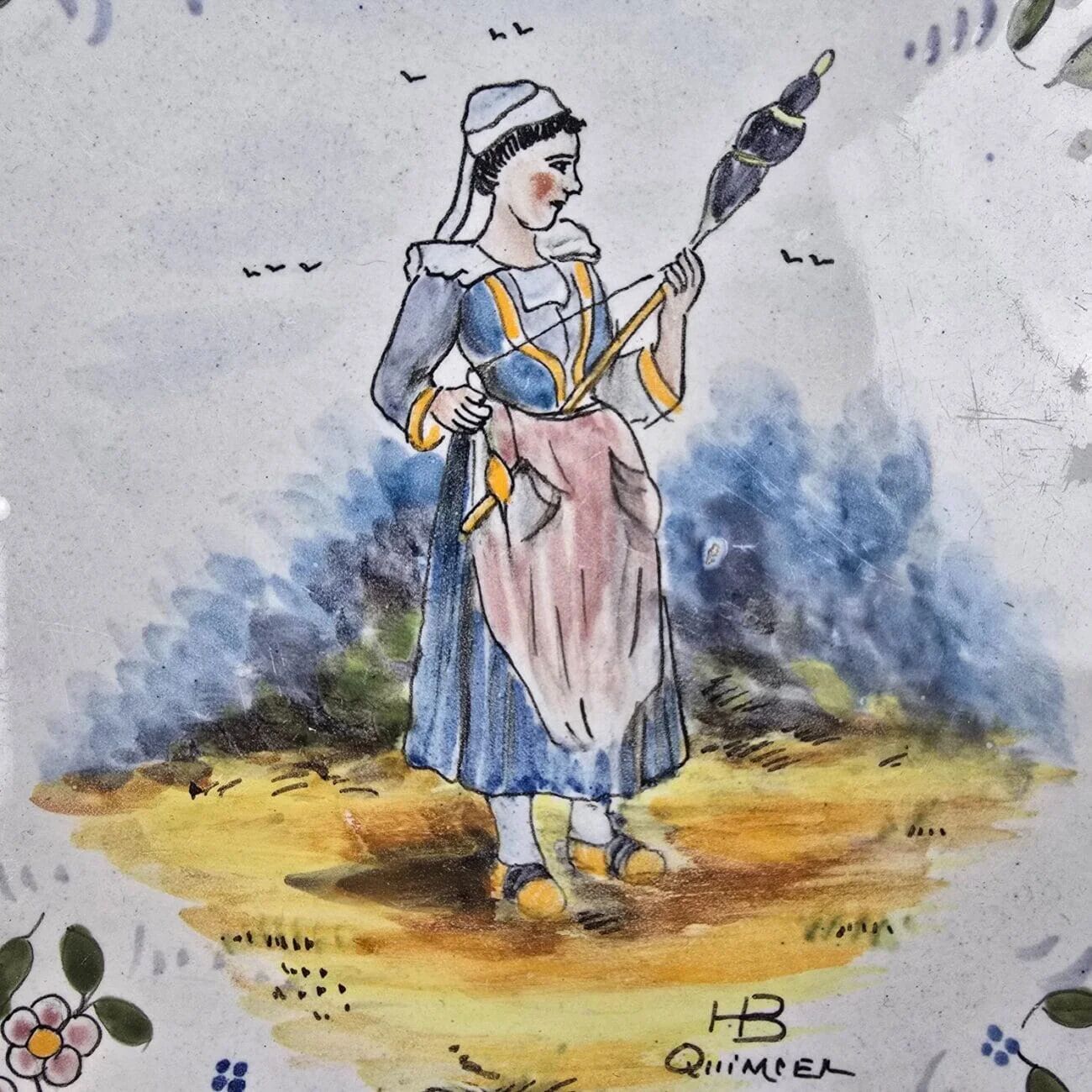 Old HB Quimper trivet – Breton woman with a distaff