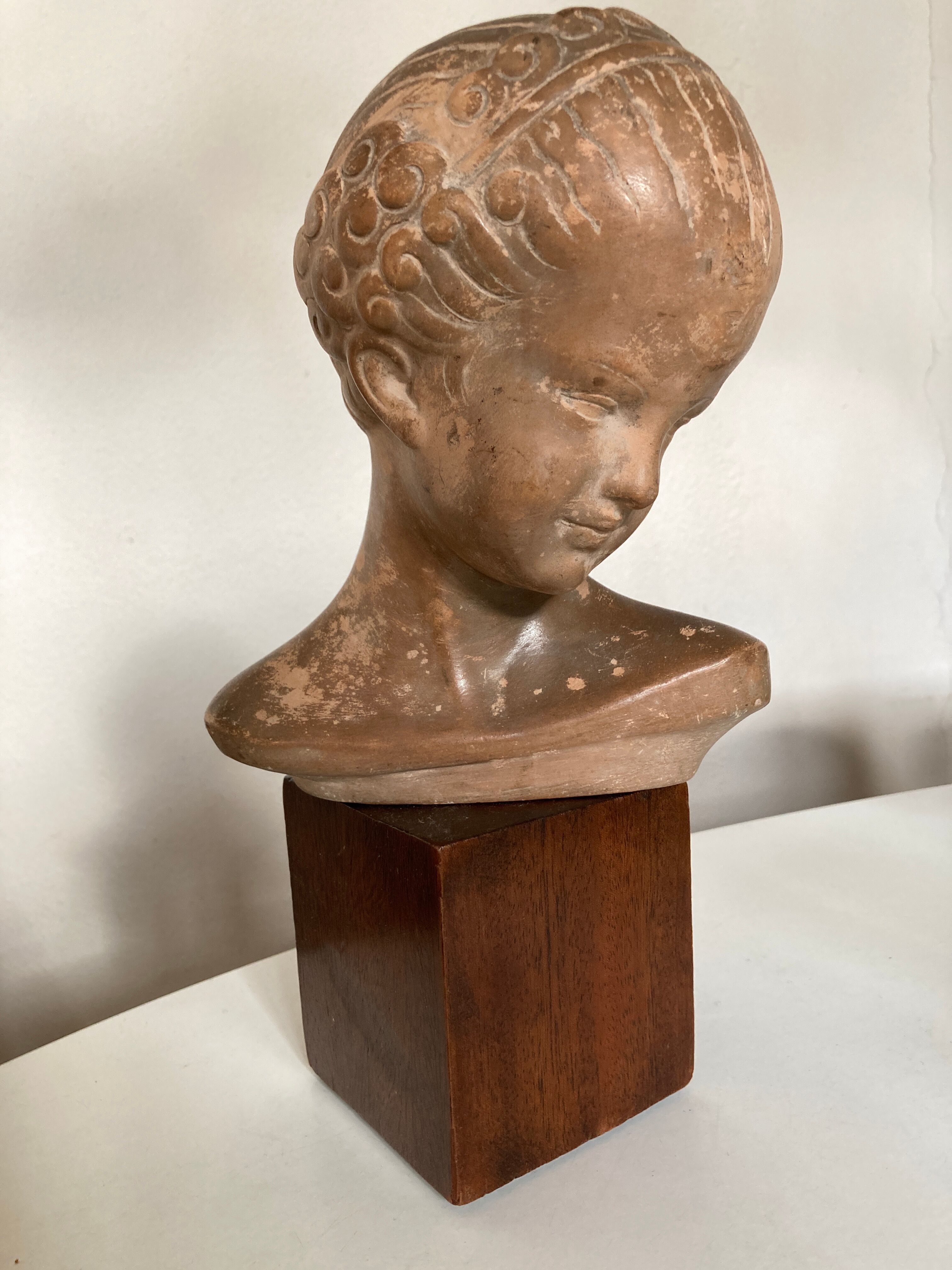 Child's head in terracotta 1920 wooden base