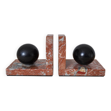 Pair of red marble bookends with black stone spheres – Art Style