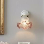 Pair of porcelain wall lights with pink glass tulips, Art Deco.