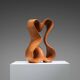 Sculpture abstraite avec des courbes organiques fluides.