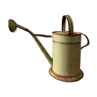 Old sheet metal watering can