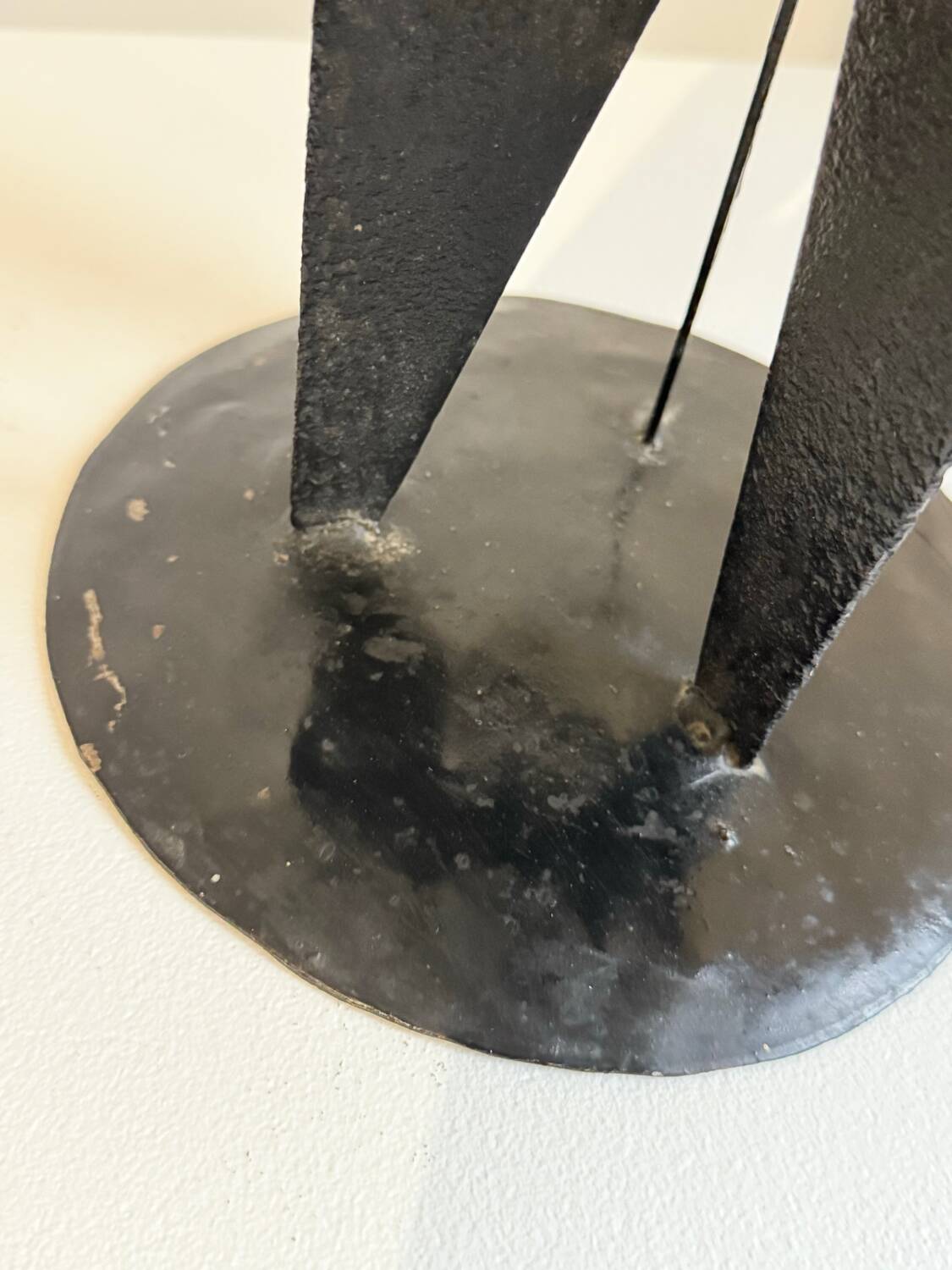 Vintage black metal brutalist tripod candlestick