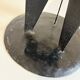 Vintage black metal brutalist tripod candlestick