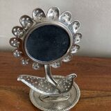 Flower mirror pocket emptier