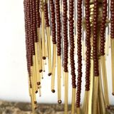 Lampe en laiton et perles, style charleston