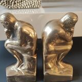 Pair of bookends inspired by Rodin's The Thinker. In gilt bronze