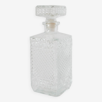 Faceted glass whiskey decanter, 1970