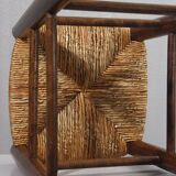 Vintage straw stool in the style of Charlotte Perriand, 1970s.