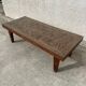 Afro style carved wooden table with glass top