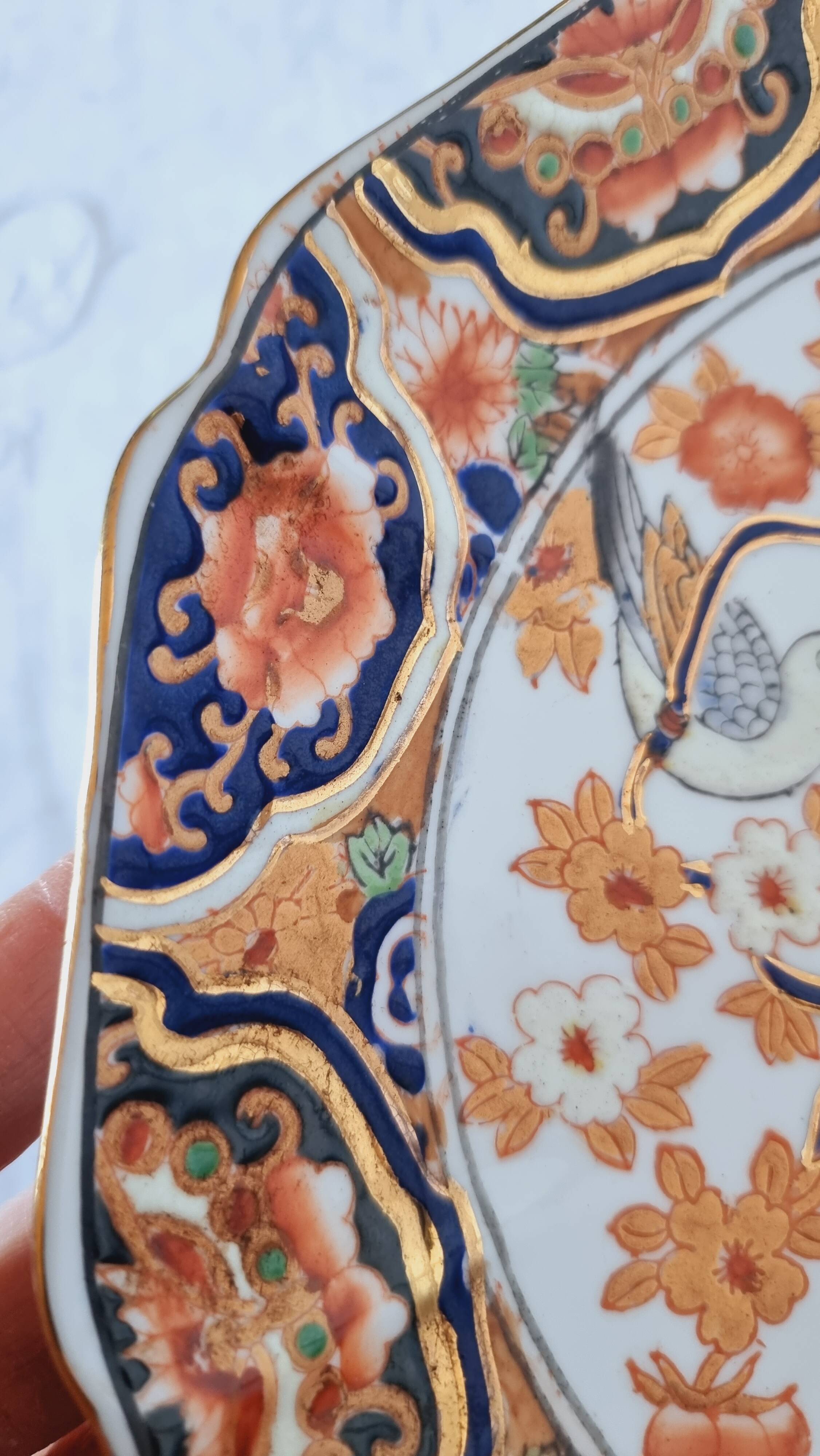 Imari-style porcelain plate, hand-painted, Japan, mid-20th century.