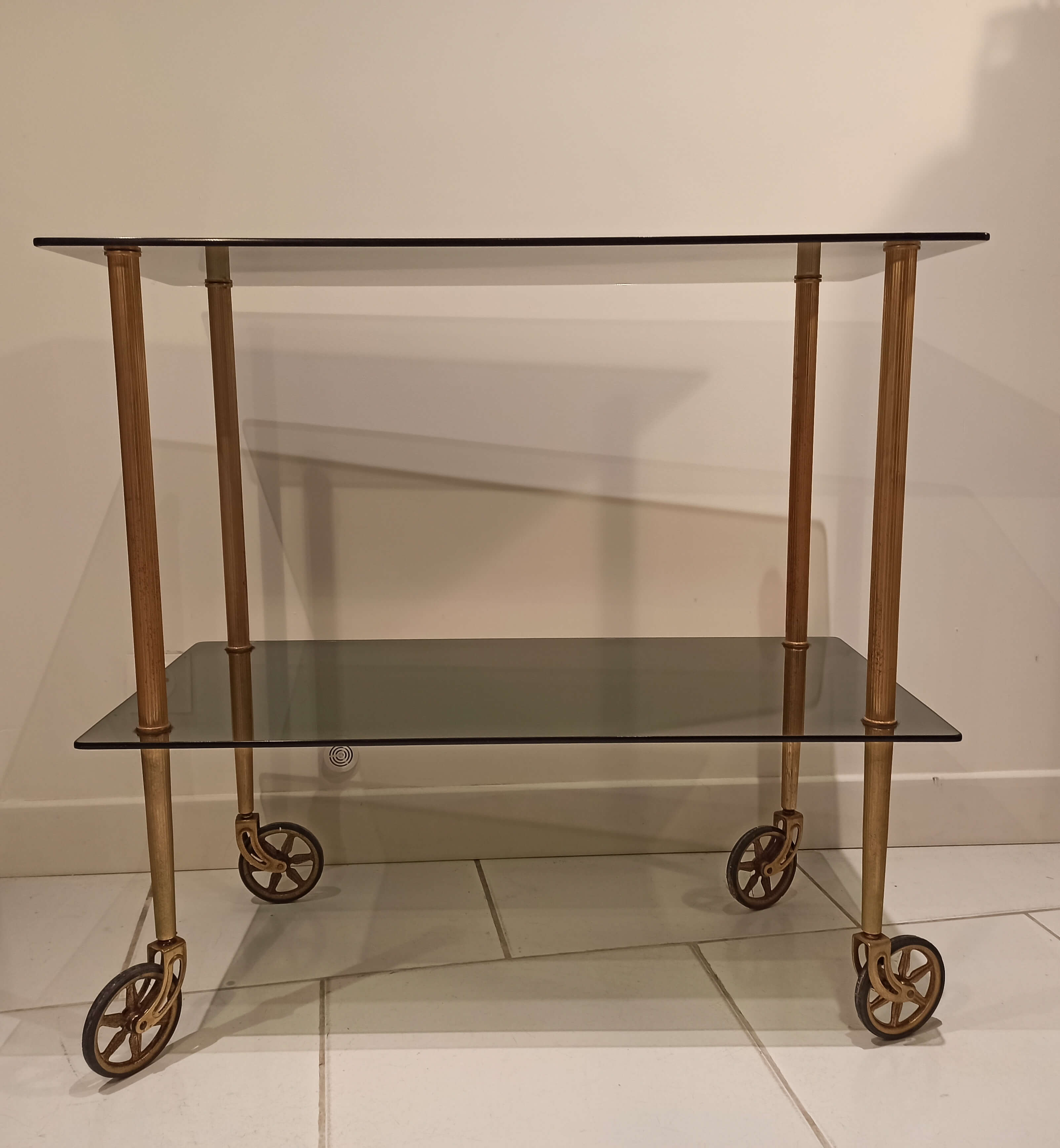 Old vintage rolling trolley, smoked glass trays, gold base